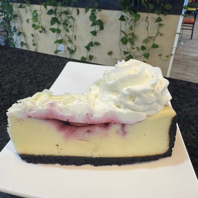 White Chocolate Raspberry Cheesecake.
